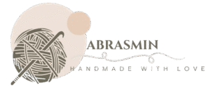 Logo of Abrasmin featuring a red yarn ball with a crochet hook and the tagline Handmade with Love